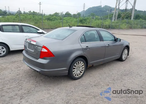 2010 Ford Fusion Hybrid из США, поврежденный, VIN 3FADP0L34AR102024